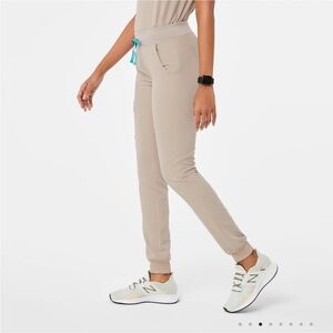 FIGS Zamora joggers and matching Rafaela top in tan